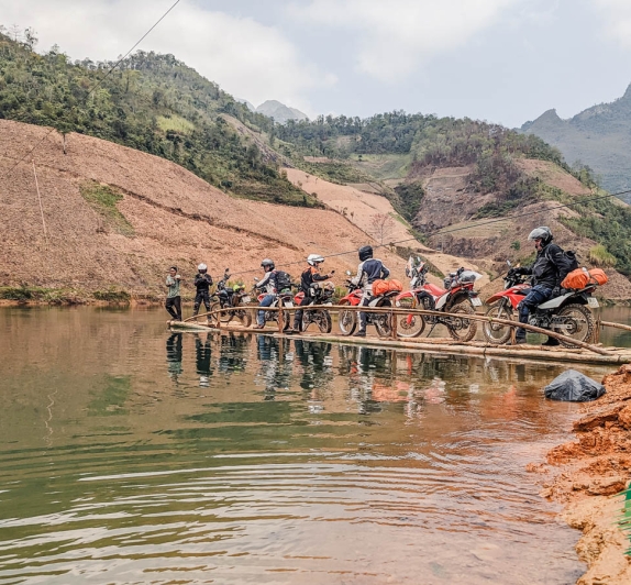 Cross The River By Bamboo Rafting 